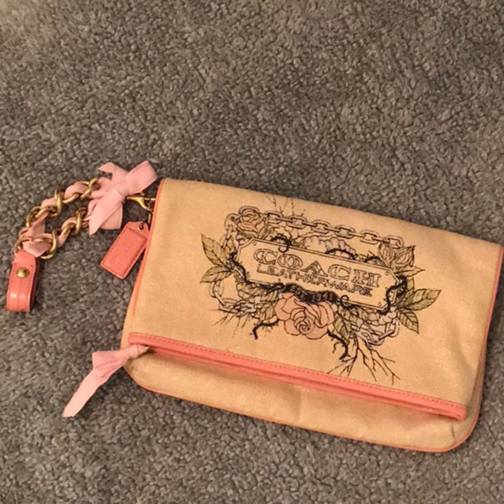 Coach canvas “tattoo” fold over Clutch Wristlet